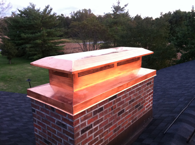Before and after chimney cap replacement in Babylon, NY