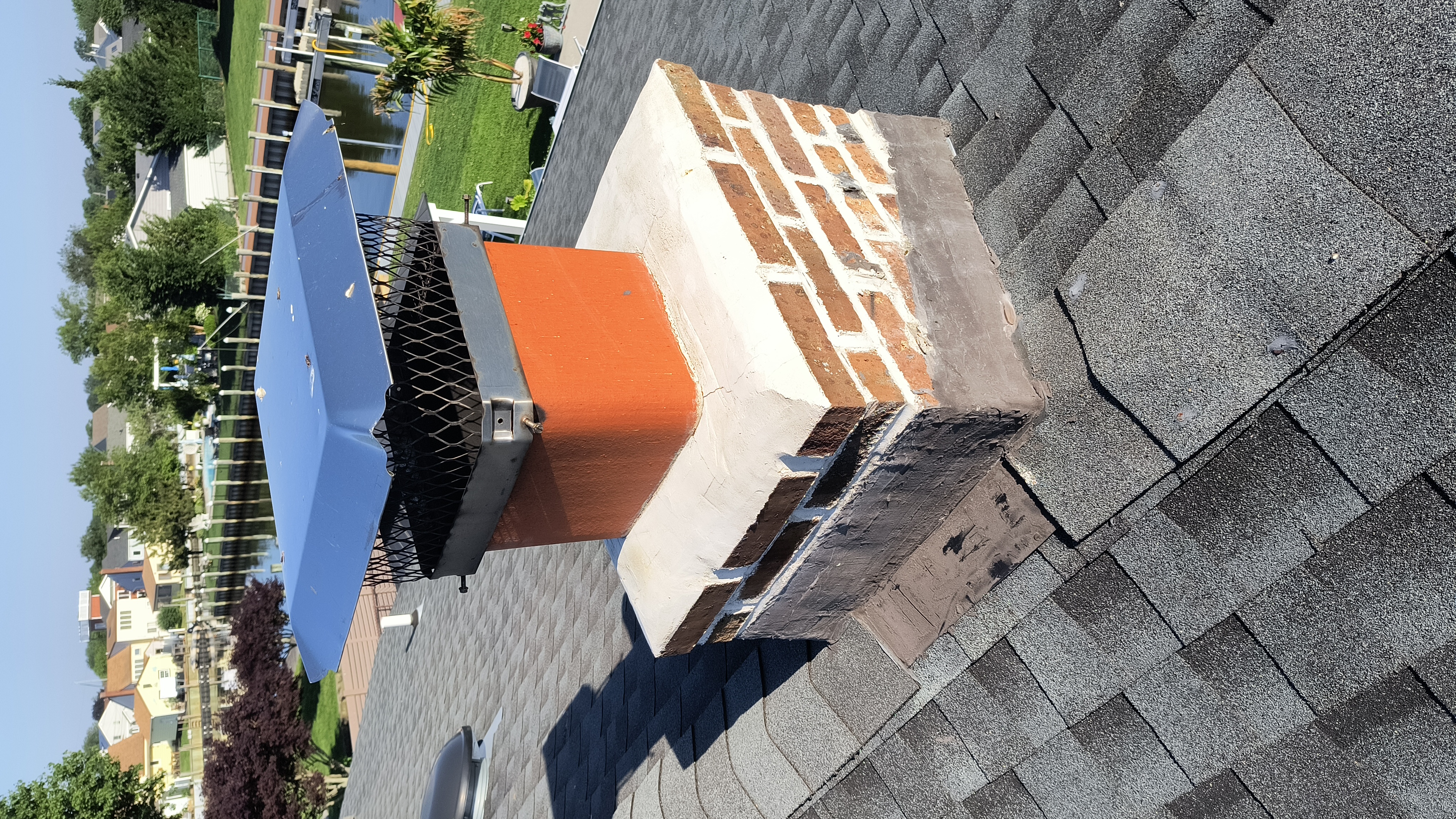 Full chimney masonry rebuild and restoration in Babylon, NY